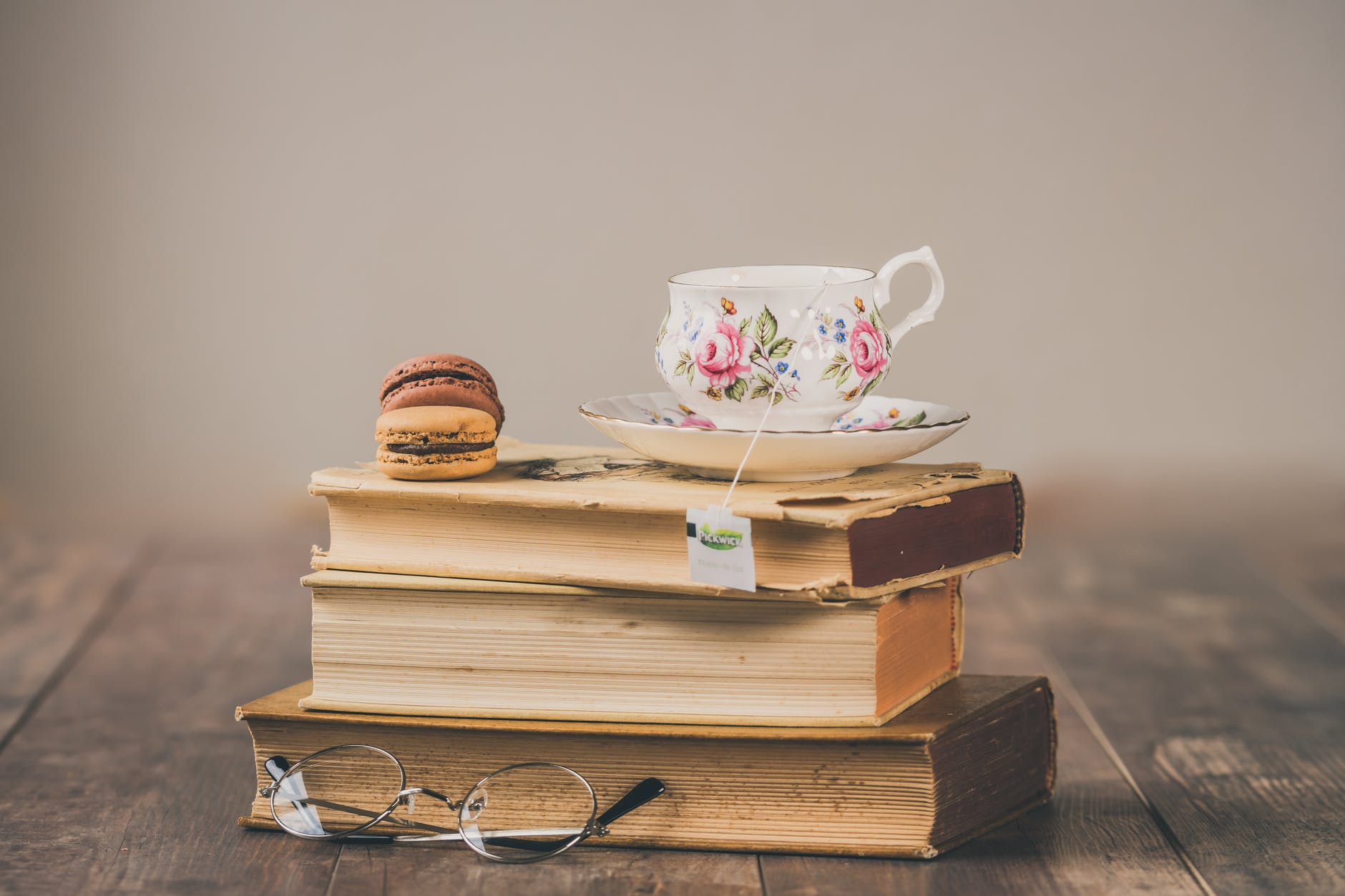 photo of teacup on top of books